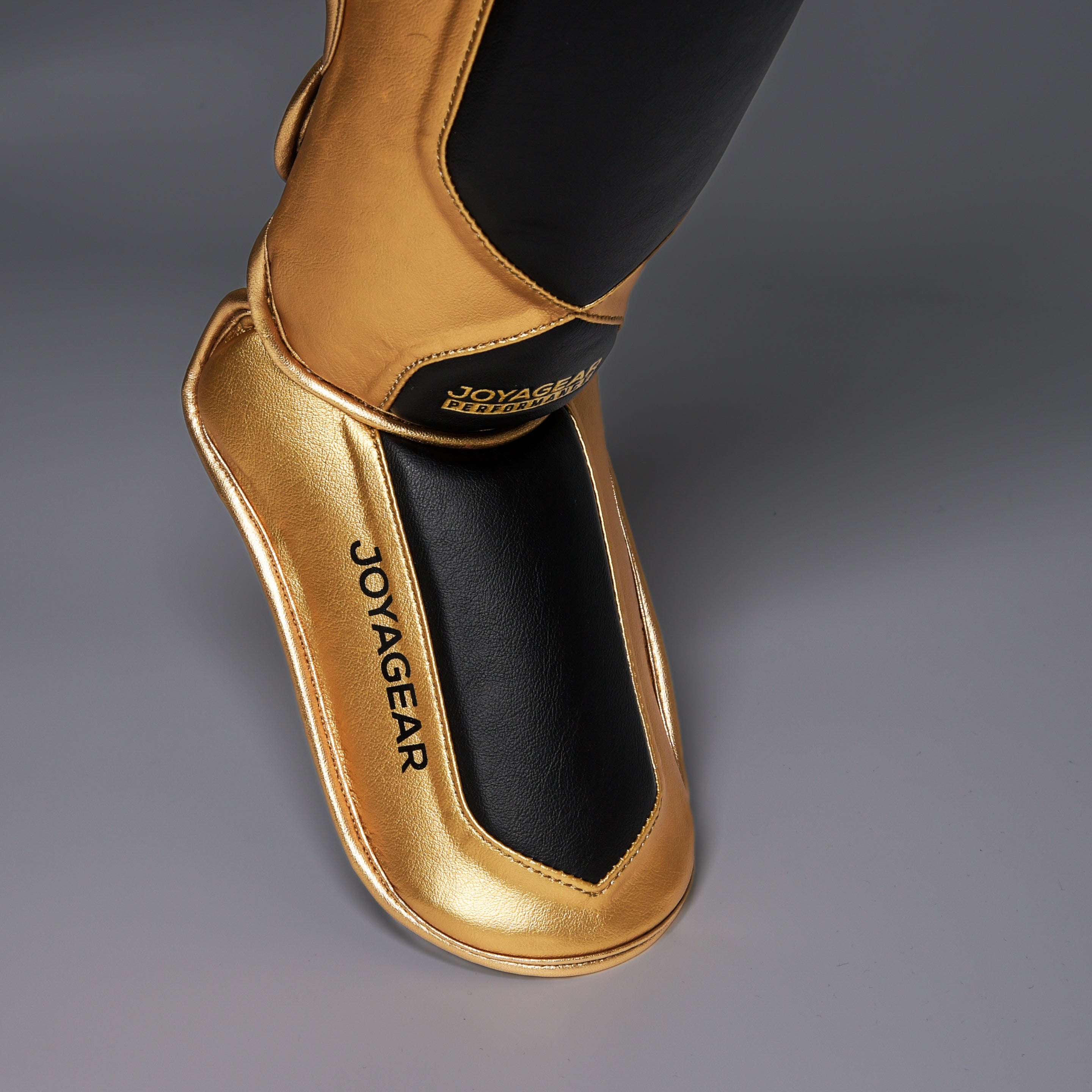 Joyagear Performance Schienbeinschoner Schwarz/Gold