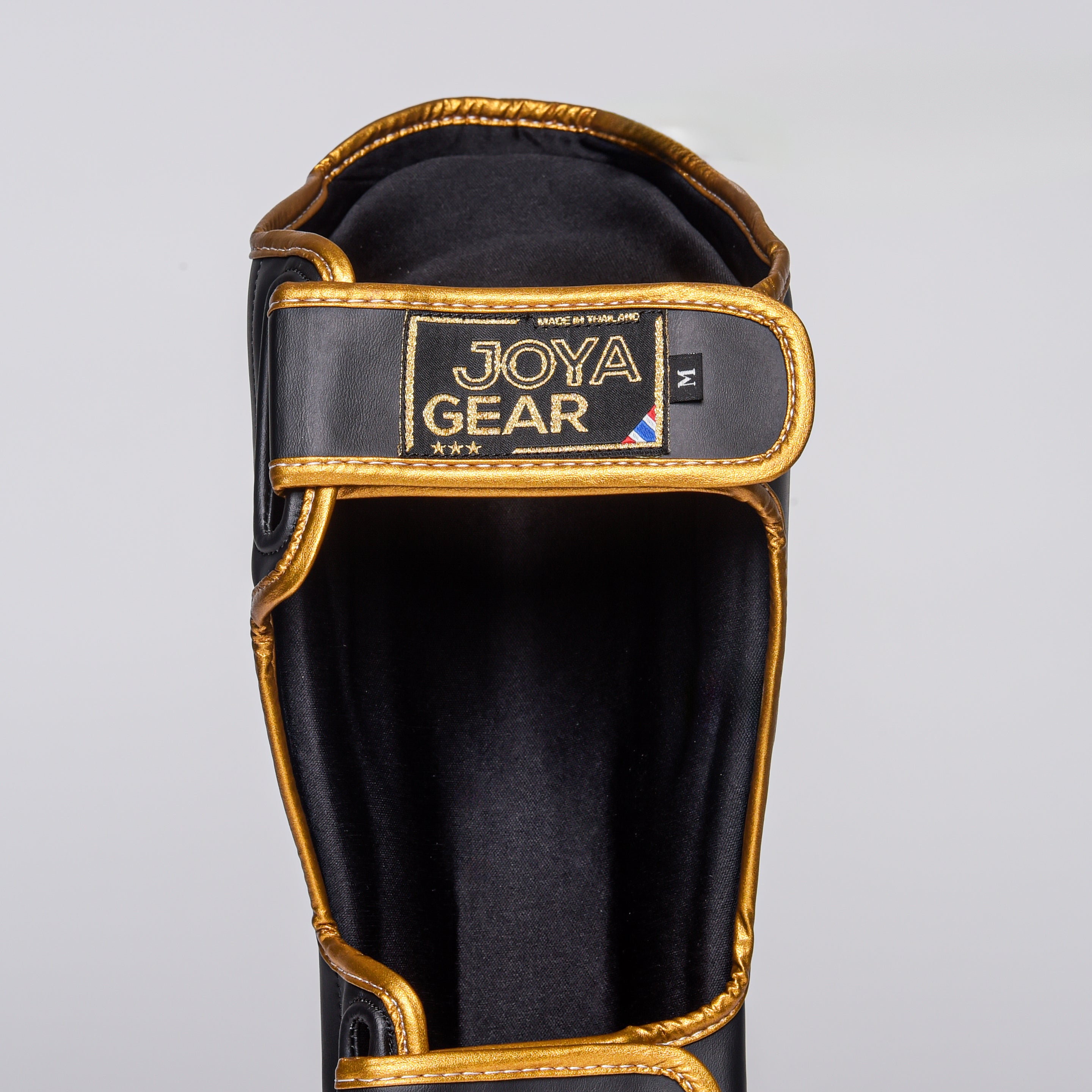 Joya Strike Schienbeinschoner - Schwarz/Gold