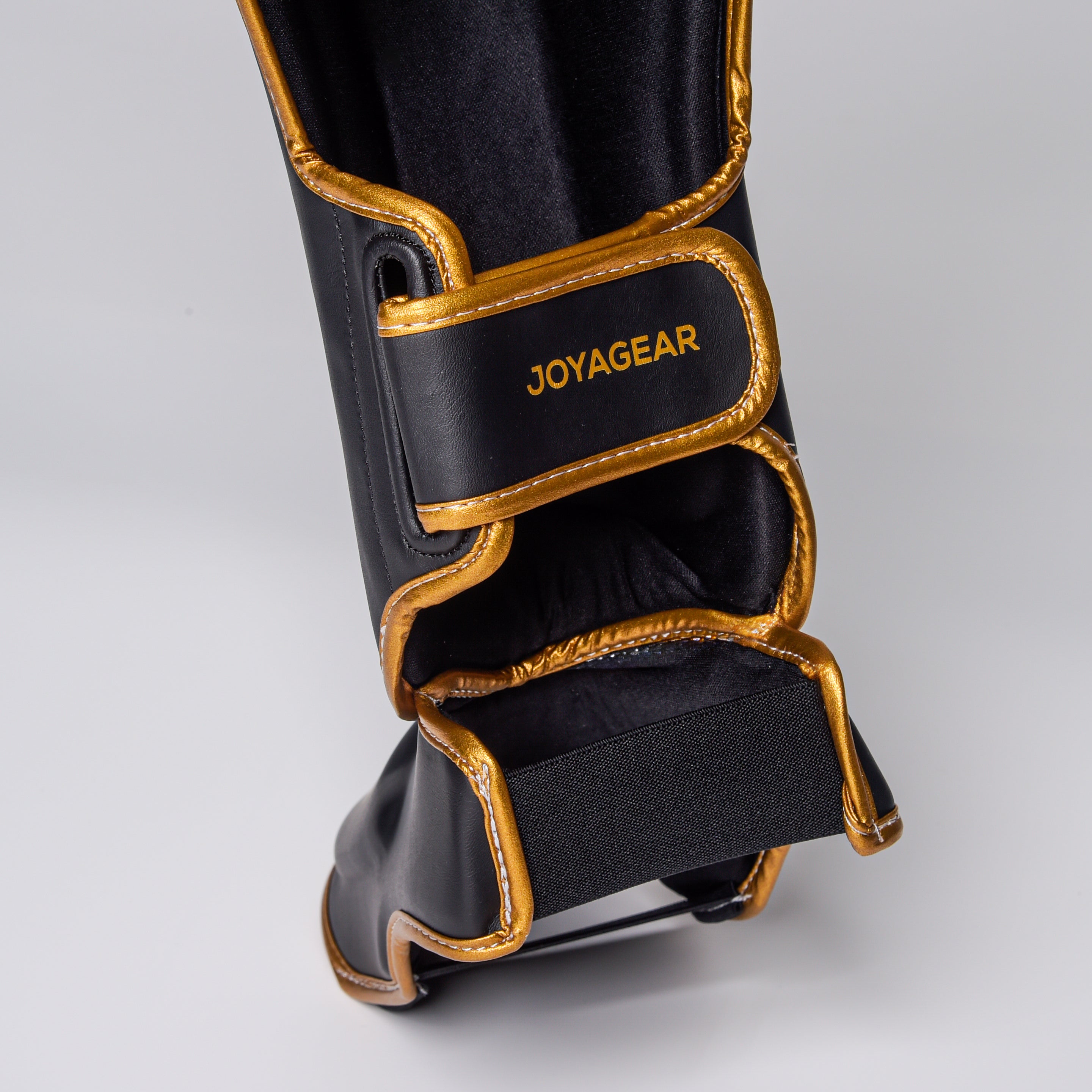 Joya Strike Schienbeinschoner - Schwarz/Gold